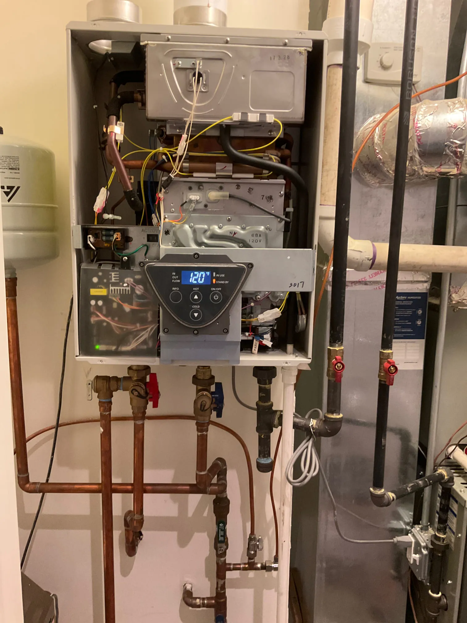 Completed a tankless water heater diagnosis, repair and service