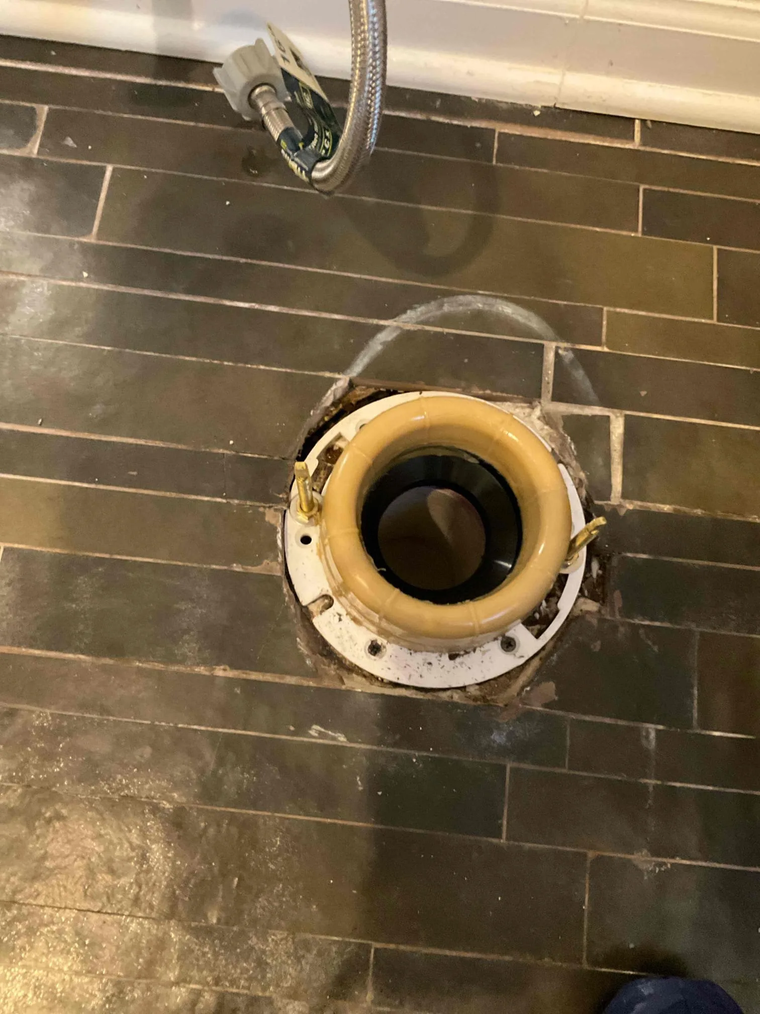Installed a new wax ring to repair a toilet