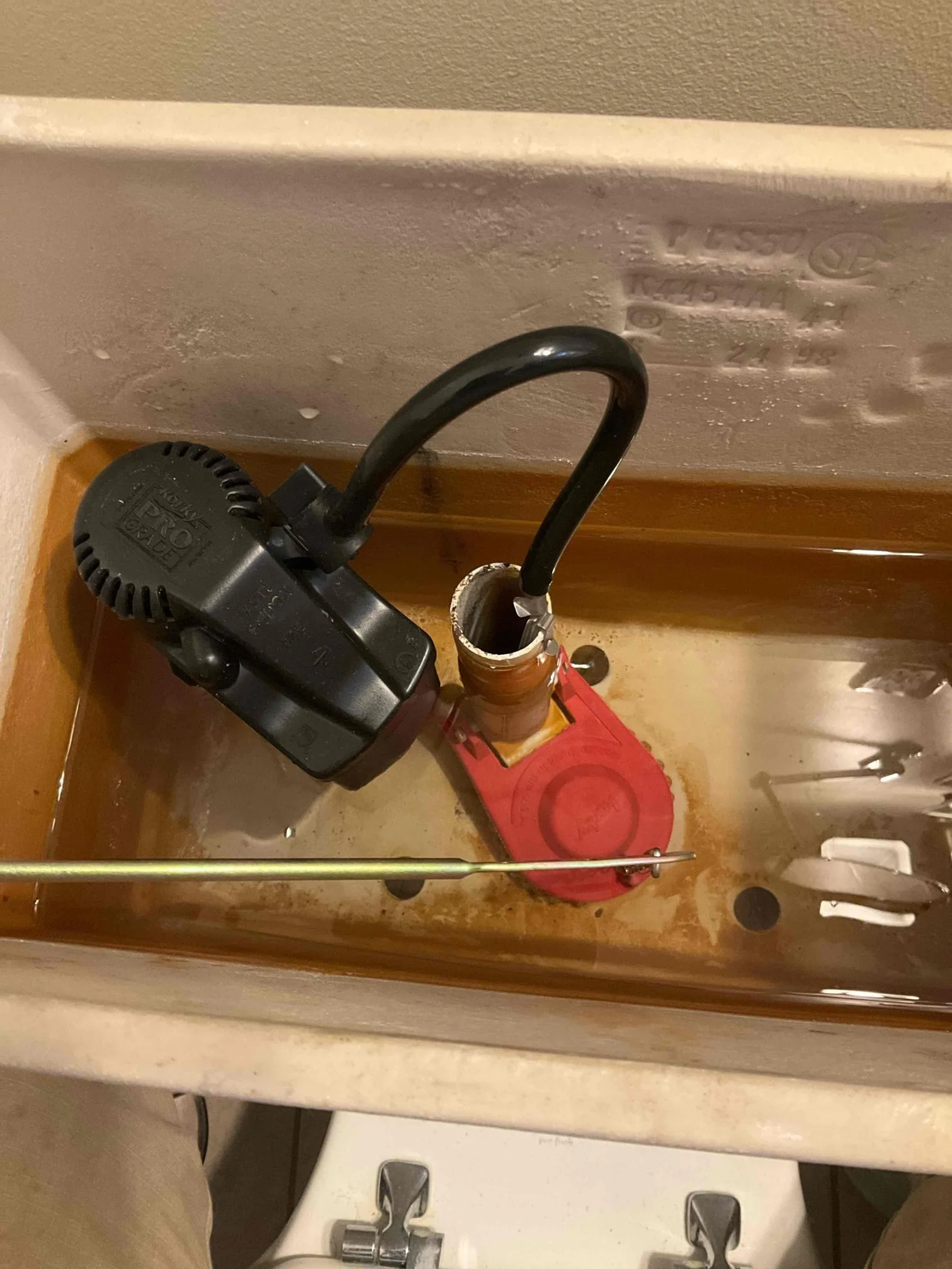 Replaced internal toilet tank parts for a tune-up job
